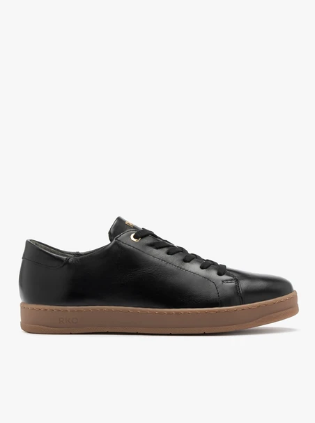 Schwarze sportliche Halbschuhe mit beigem Boden