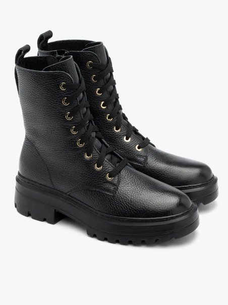 Schwarze Damenstiefel mit festem Boden
