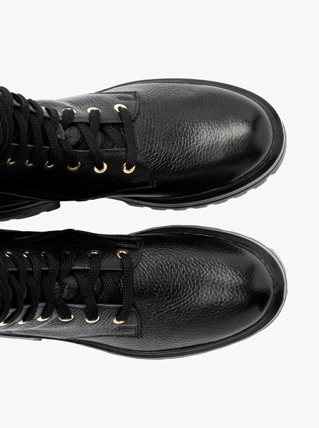 Schwarze Damenstiefel mit festem Boden
