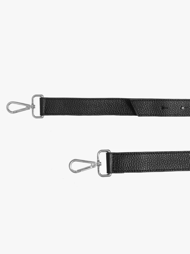 Schwarzer Lederhandtaschenriemen