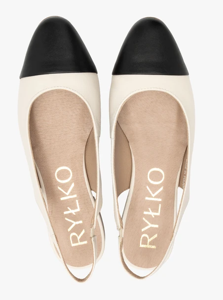 Cremefarbene und schwarze Slingback-Ballerinas