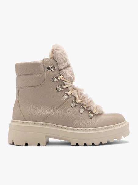 Beigefarbene Stiefel mit Fell an der Zunge