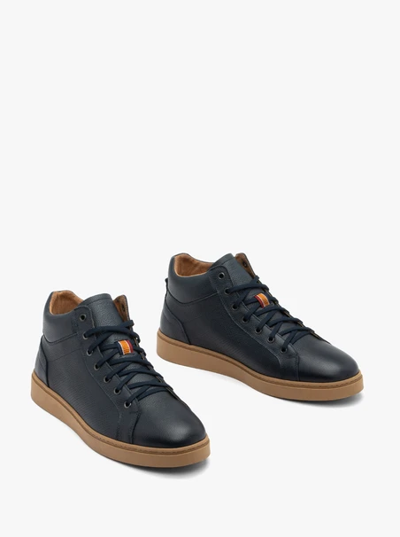 Marineblaue unisolierte Stiefel