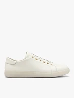 Cremefarbene Halbschuhe im sportlichen Stil auf flachem Boden