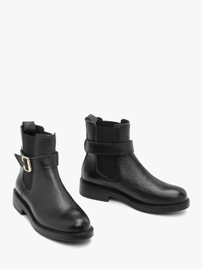 Schwarze Lederslipper mit Schnalle