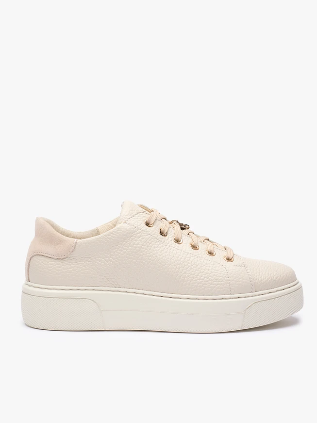 Cremefarbene Turnschuhe aus Leder und Velours