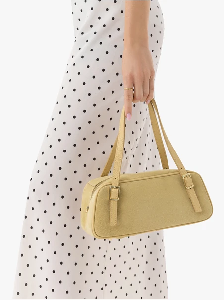 Leuchtend gelbe Baguettetasche