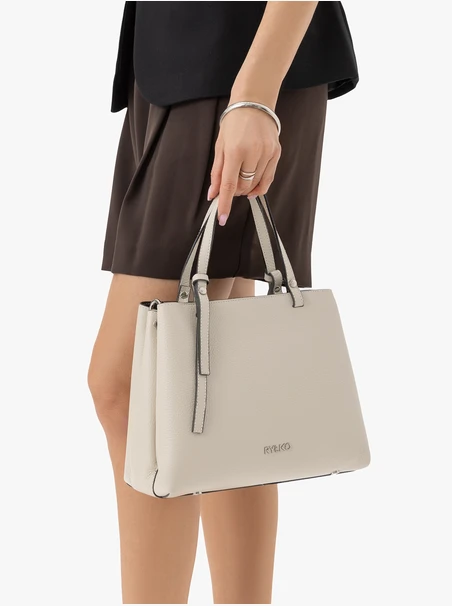 Cremefarbene elegante Handtasche