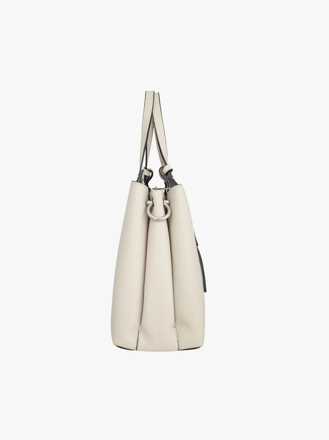 Cremefarbene elegante Handtasche