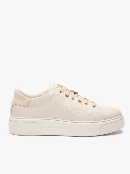 Cremefarbene Turnschuhe aus Leder und Velours