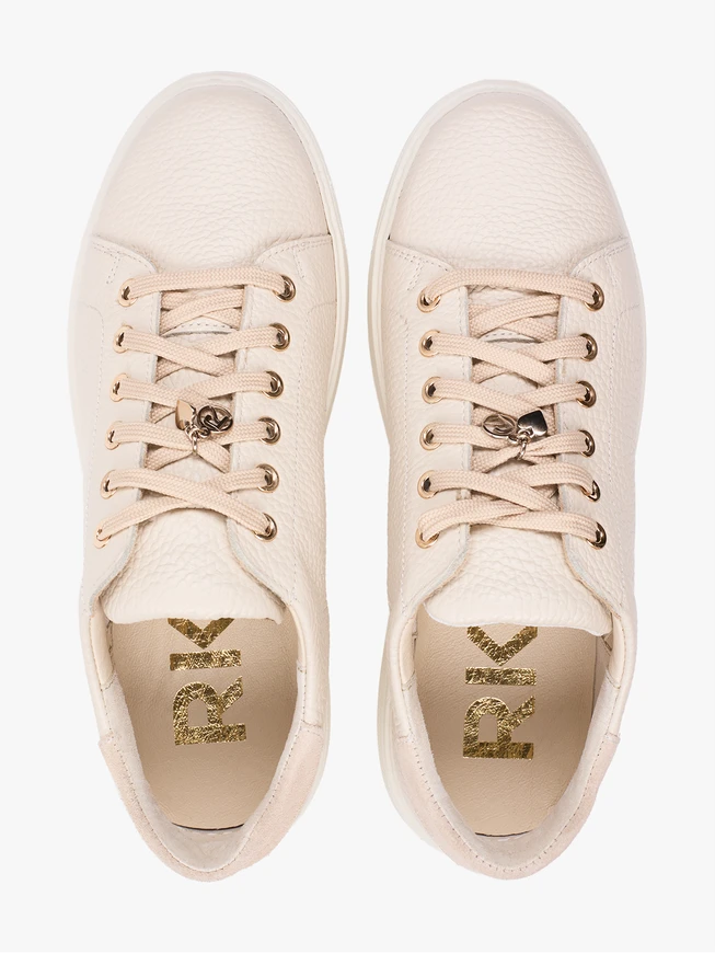 Cremefarbene Turnschuhe aus Leder und Velours