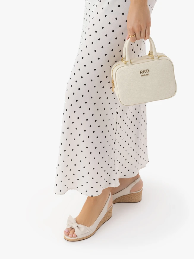 Cremefarbene Bowlingtasche