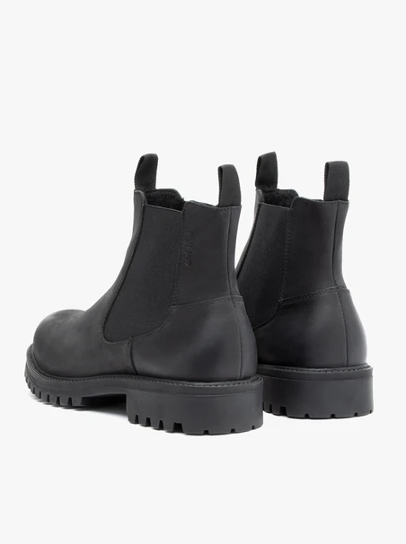 Schwarze Nubukleder-Pantoffeln