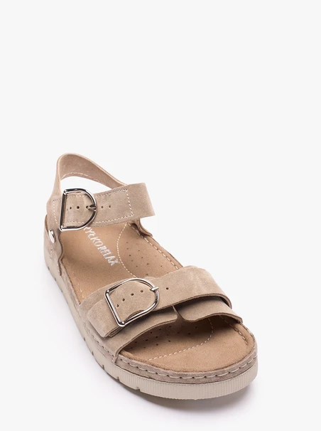 Dunkelbeige Sandalen auf einem dickeren Boden mit zwei Riemen