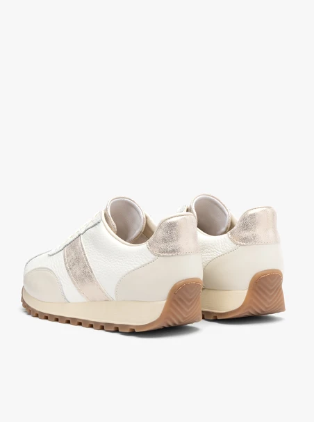 Cremefarbene Sportschuhe mit goldenen Streifen