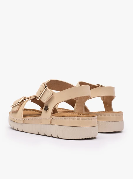Beigefarbene Sandalen mit dickerem Boden und zwei Riemen