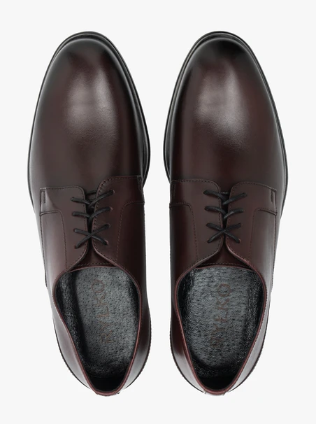 Kastanienbraune formelle Schuhe