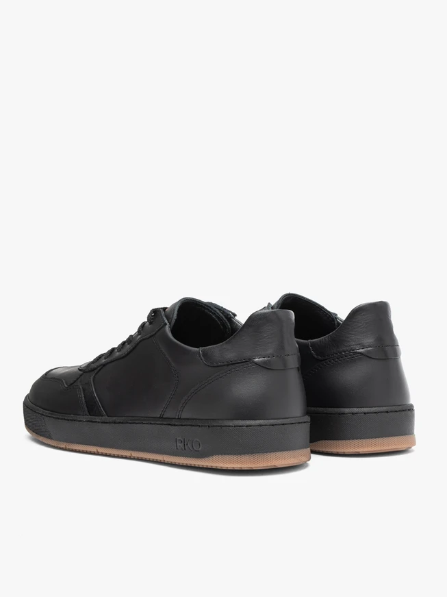 Schwarze Sporthalbschuhe aus Leder