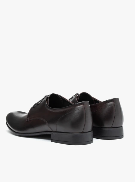 Kastanienbraune formelle Schuhe