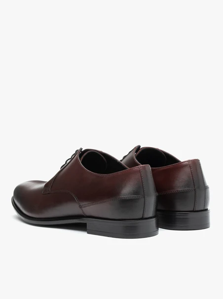 Kastanienbraune formelle Schuhe