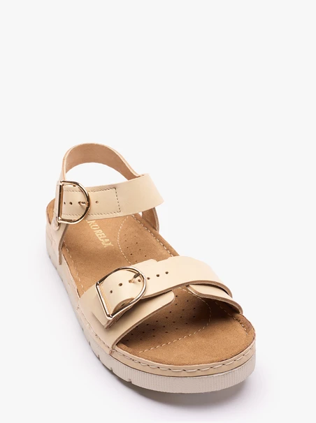 Beigefarbene Sandalen mit dickerem Boden und zwei Riemen