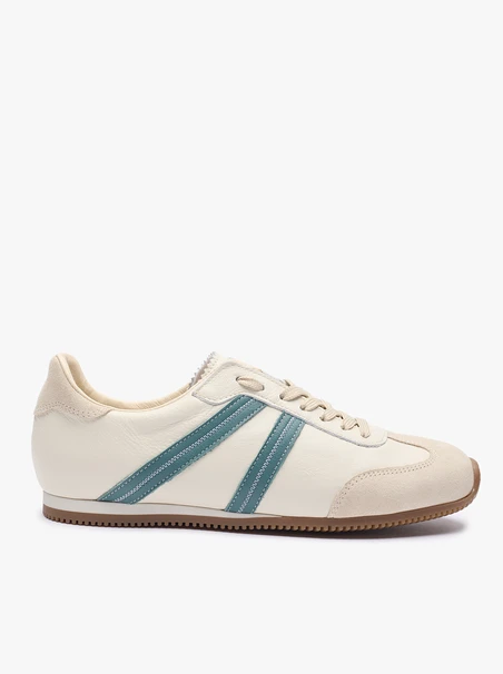 Cremefarbene Sporthalbschuhe mit türkisem Streifen