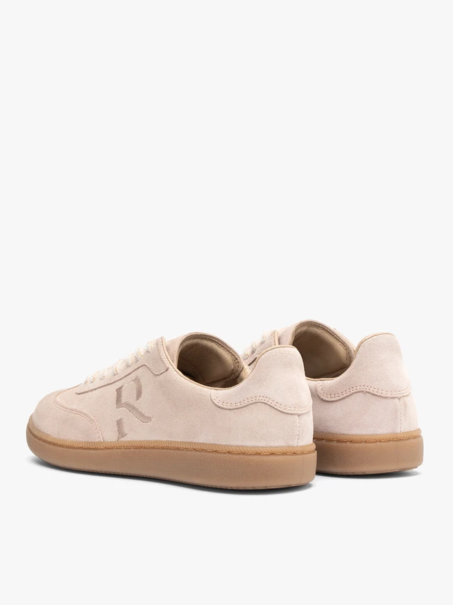 Beigefarbene Sportschuhe zum Schnüren