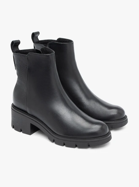 Schwarze solide Stiefel