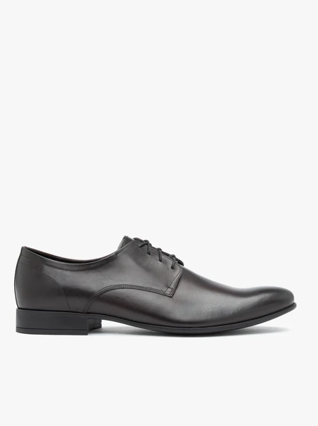 Kastanienbraune formelle Schuhe
