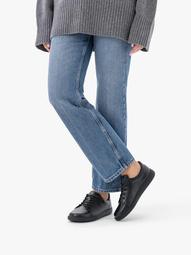 Schwarze Sporthalbschuhe aus Leder