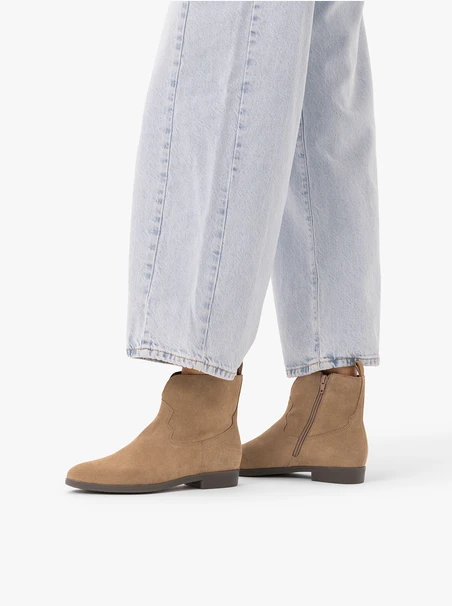 Beigefarbene Cowboystiefel aus Veloursleder
