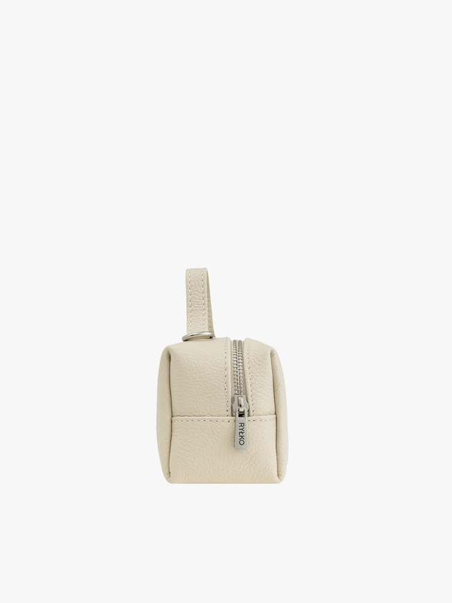 Cremefarbene kleine Lederhandtasche