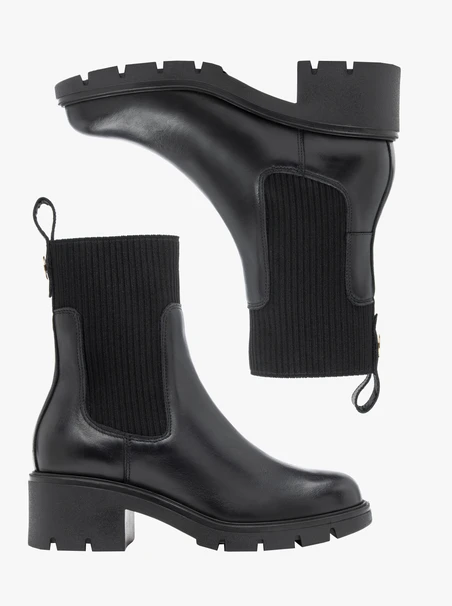<p>Schwarze, höhere Stiefeletten mit Gummizug</p>