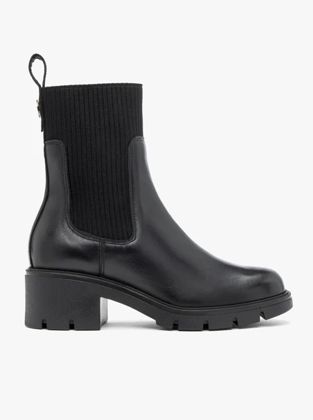 <p>Schwarze, höhere Stiefeletten mit Gummizug</p>